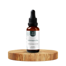 Frasco gotario de Ashwagandha líquida sobre una base de madera